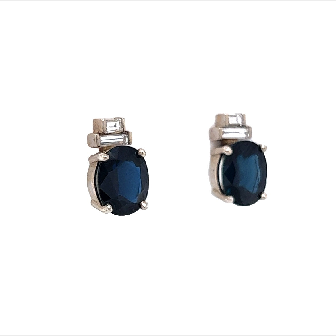 Oval Cut Sapphire and Diamond Earrings in 14K White Gold