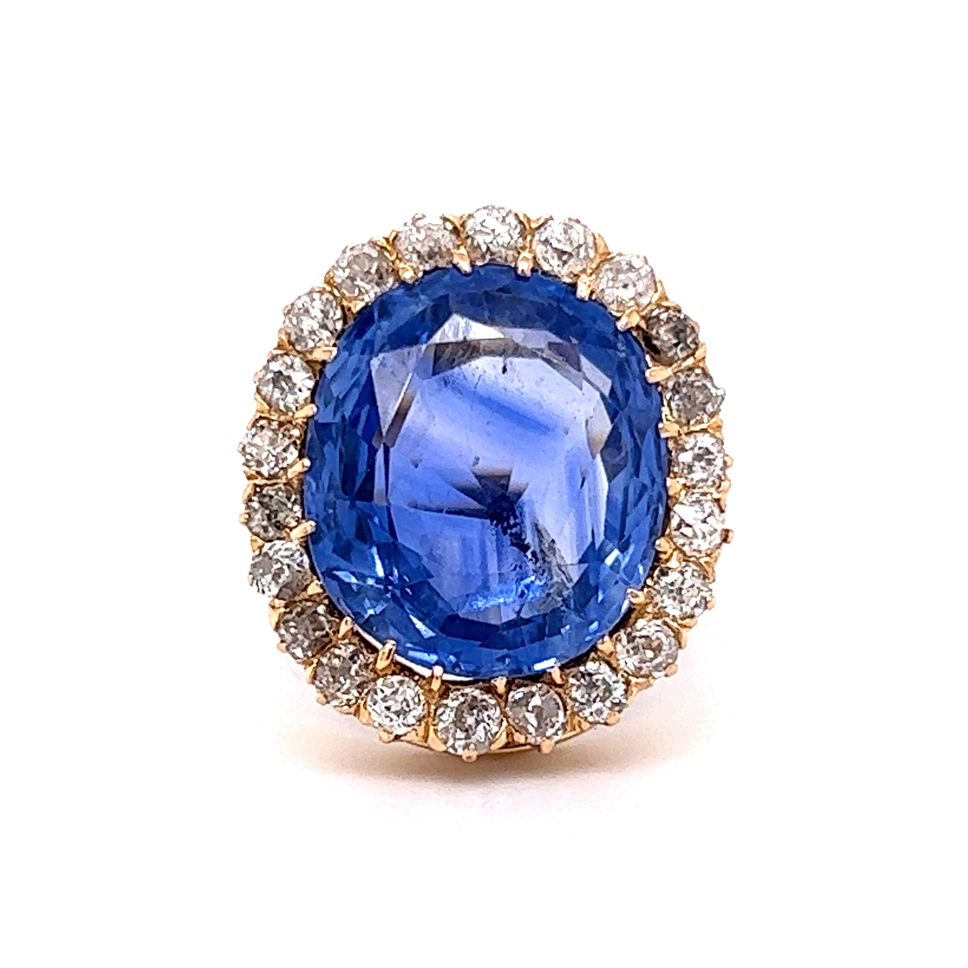 Victorian Ceylon Sapphire & Diamond Cocktail Ring in 18kComposition: 18 Karat Yellow Gold Ring Size: 6.25 Total Diamond Weight: 1.32ct Total Gram Weight: 7.6 g