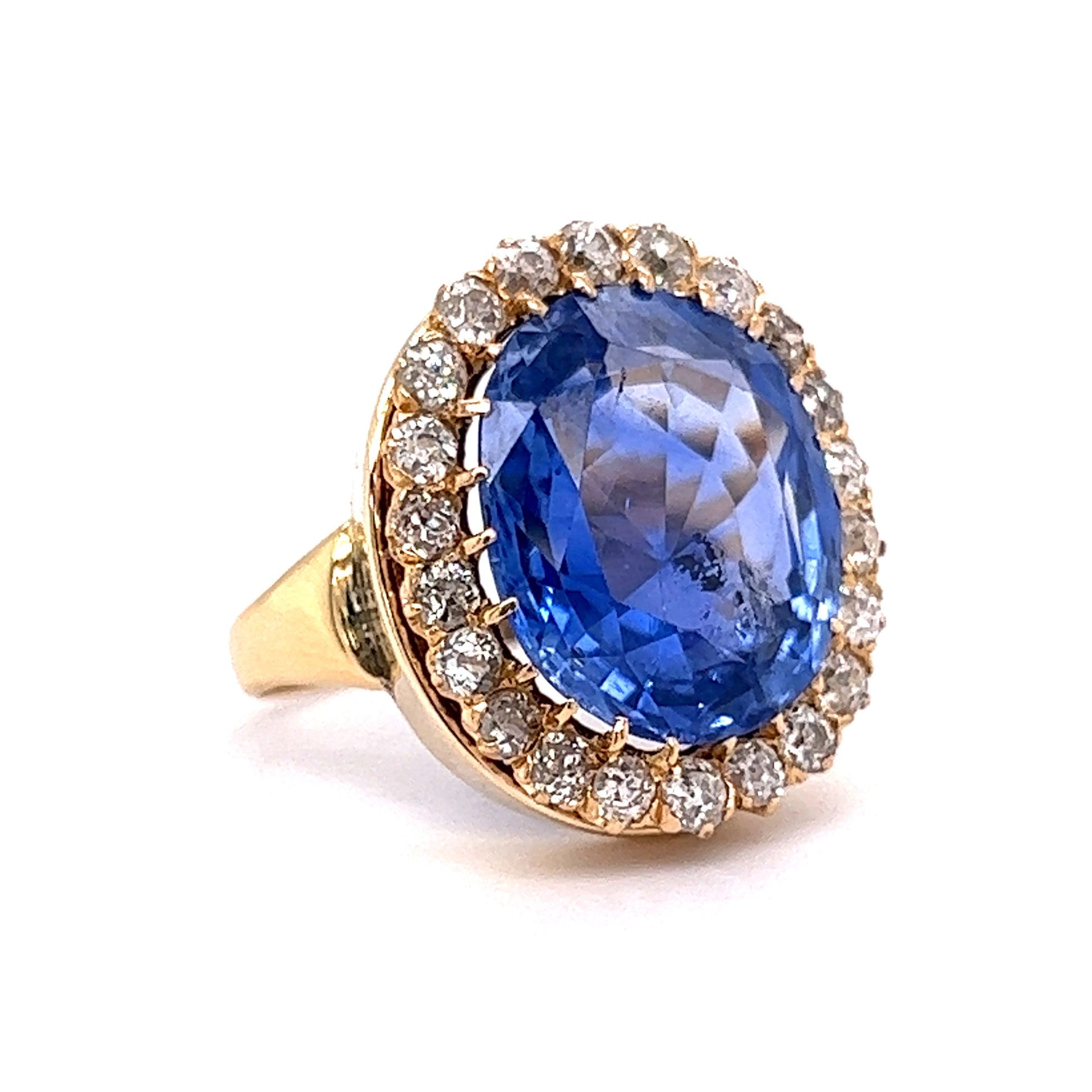 Victorian Ceylon Sapphire & Diamond Cocktail Ring in 18kComposition: 18 Karat Yellow Gold Ring Size: 6.25 Total Diamond Weight: 1.32ct Total Gram Weight: 7.6 g