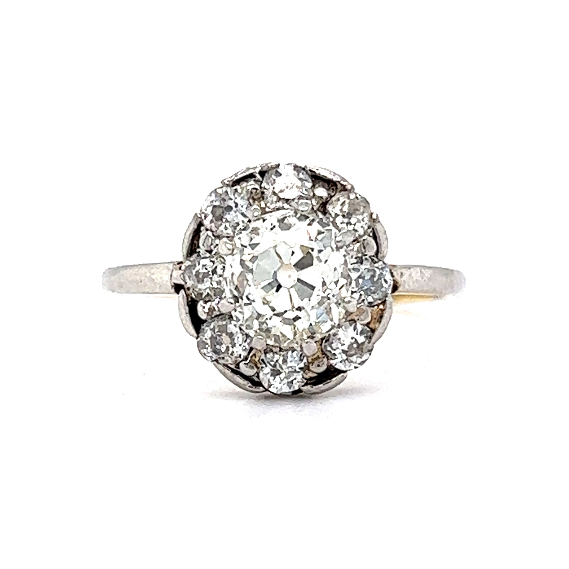 .93 Victorian Diamond Halo Engagement Ring in Platinum & 18kComposition: Platinum/18 Karat Yellow Gold Ring Size: 5 Total Diamond Weight: 1.33ct Total Gram Weight: 3.0 g