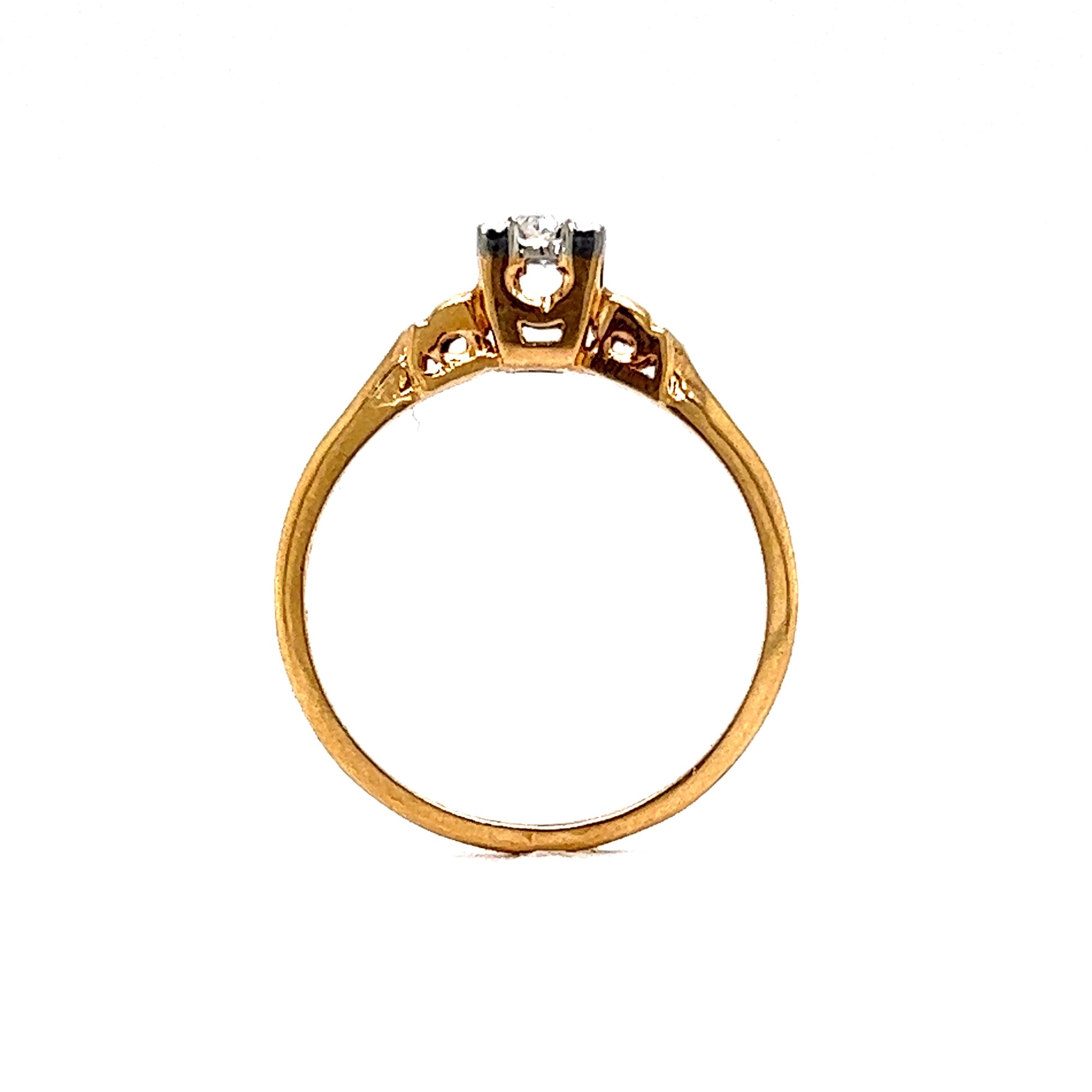 .07 Transitional Solitaire Engagement Ring in 14k Yellow & White GoldComposition: 14 Karat Yellow Gold/14 Karat White Gold Ring Size: 6.25 Total Diamond Weight: .07ct Total Gram Weight: 1.7 g Inscription: 14k
      