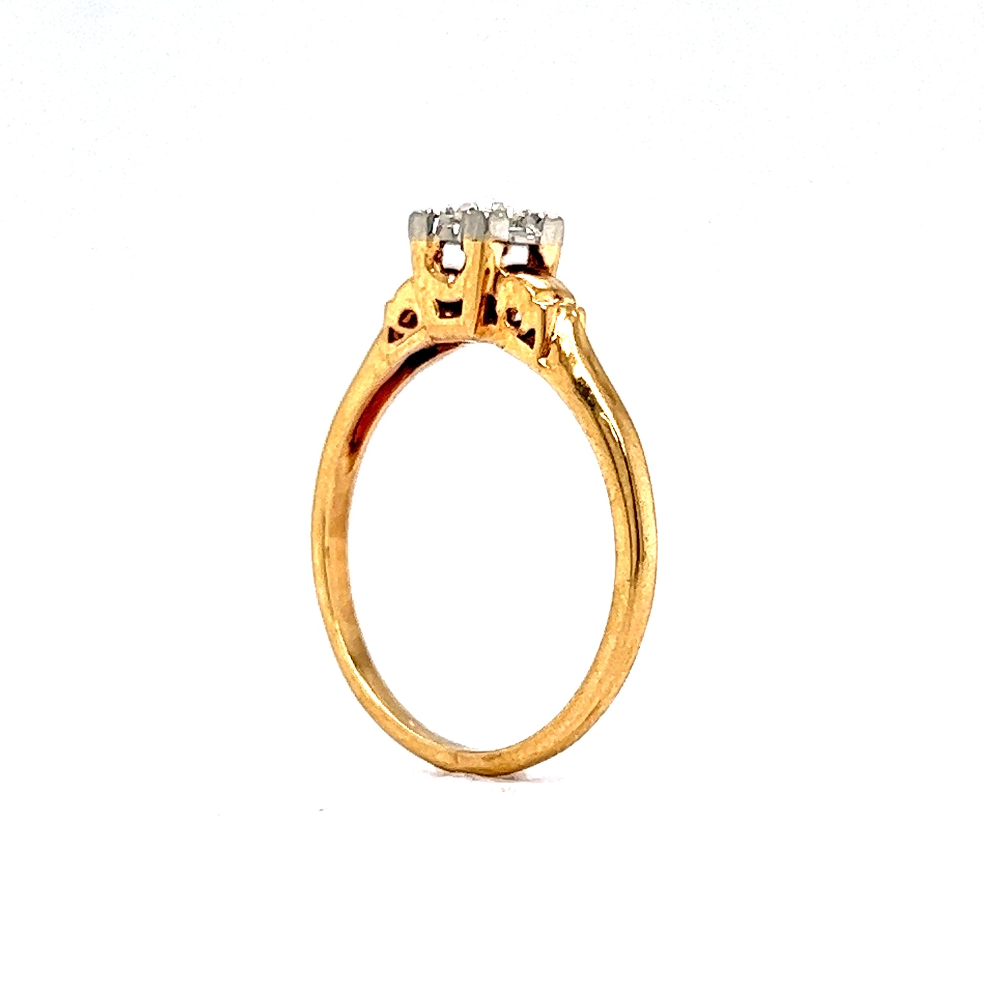 .07 Transitional Solitaire Engagement Ring in 14k Yellow & White GoldComposition: 14 Karat Yellow Gold/14 Karat White Gold Ring Size: 6.25 Total Diamond Weight: .07ct Total Gram Weight: 1.7 g Inscription: 14k
      