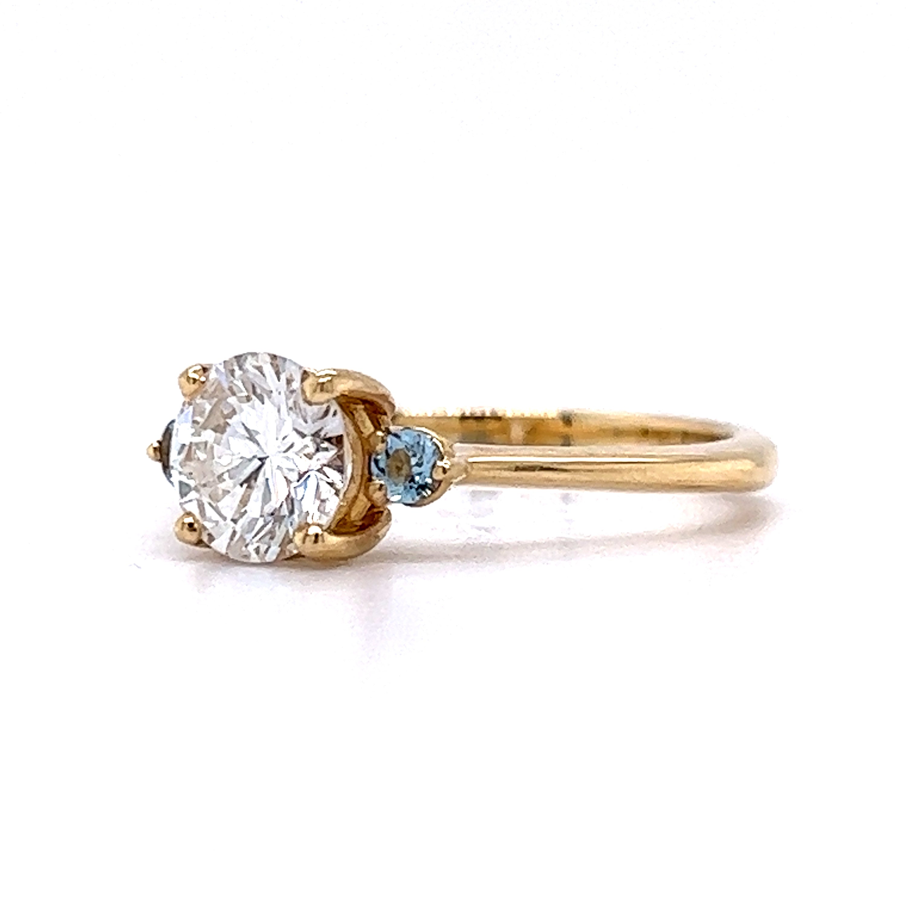 Diamond engagement ring hot sale with aquamarine accents