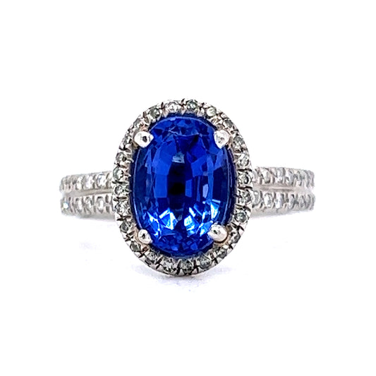 Oval Cut Tanzanite & Diamond Halo Ring in Platinum