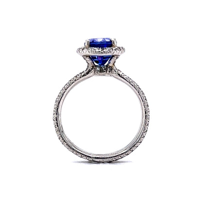 Oval Cut Tanzanite & Diamond Halo Ring in Platinum