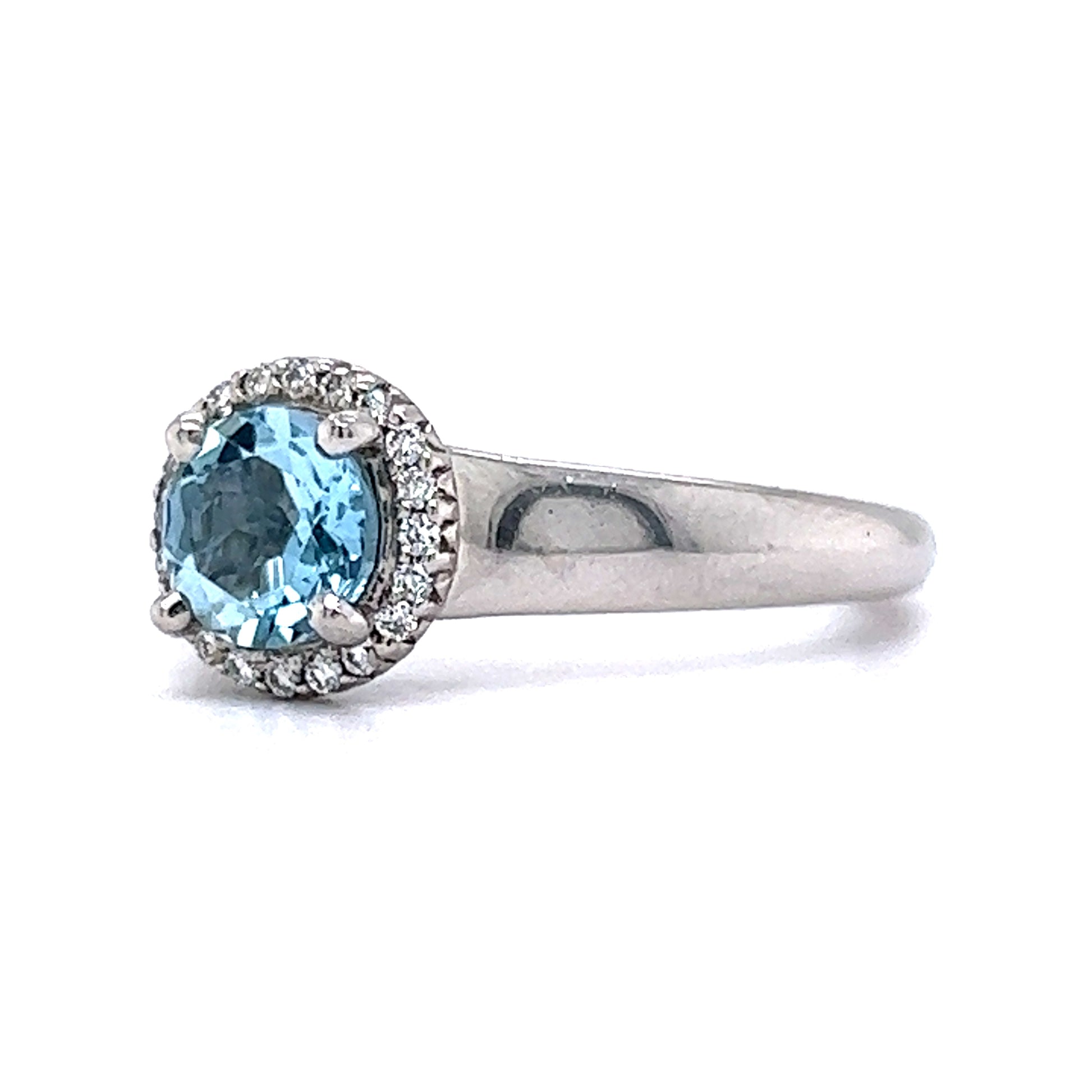 .75 Aquamarine & Diamond Halo Engagement Ring in PlatinumComposition: PlatinumRing Size: 6.5Total Diamond Weight: .20 ctTotal Gram Weight: 8.0 gInscription: RITANI PT900