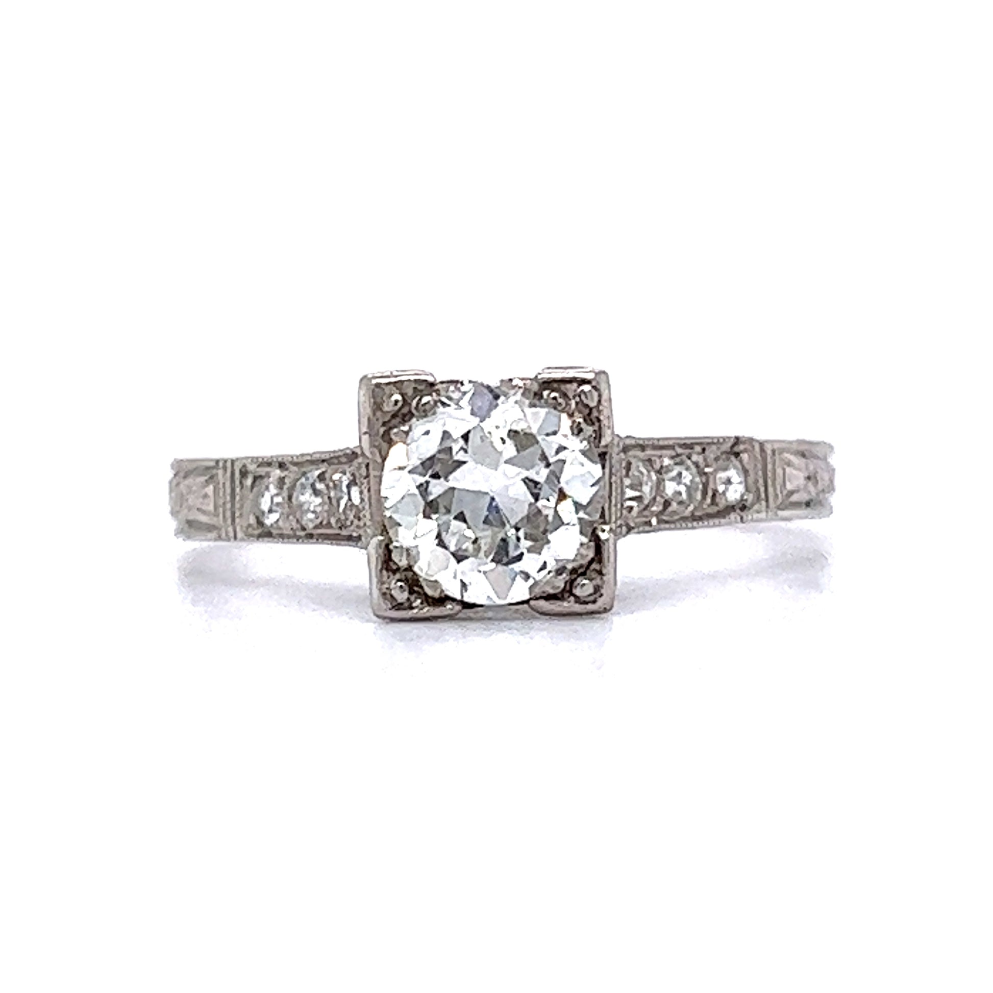 .70 Old European Cut Diamond Engagement Ring in PlatinumComposition: PlatinumRing Size: 7Total Diamond Weight: .79 ctTotal Gram Weight: 2.6 gInscription: 5% IRID PLAT