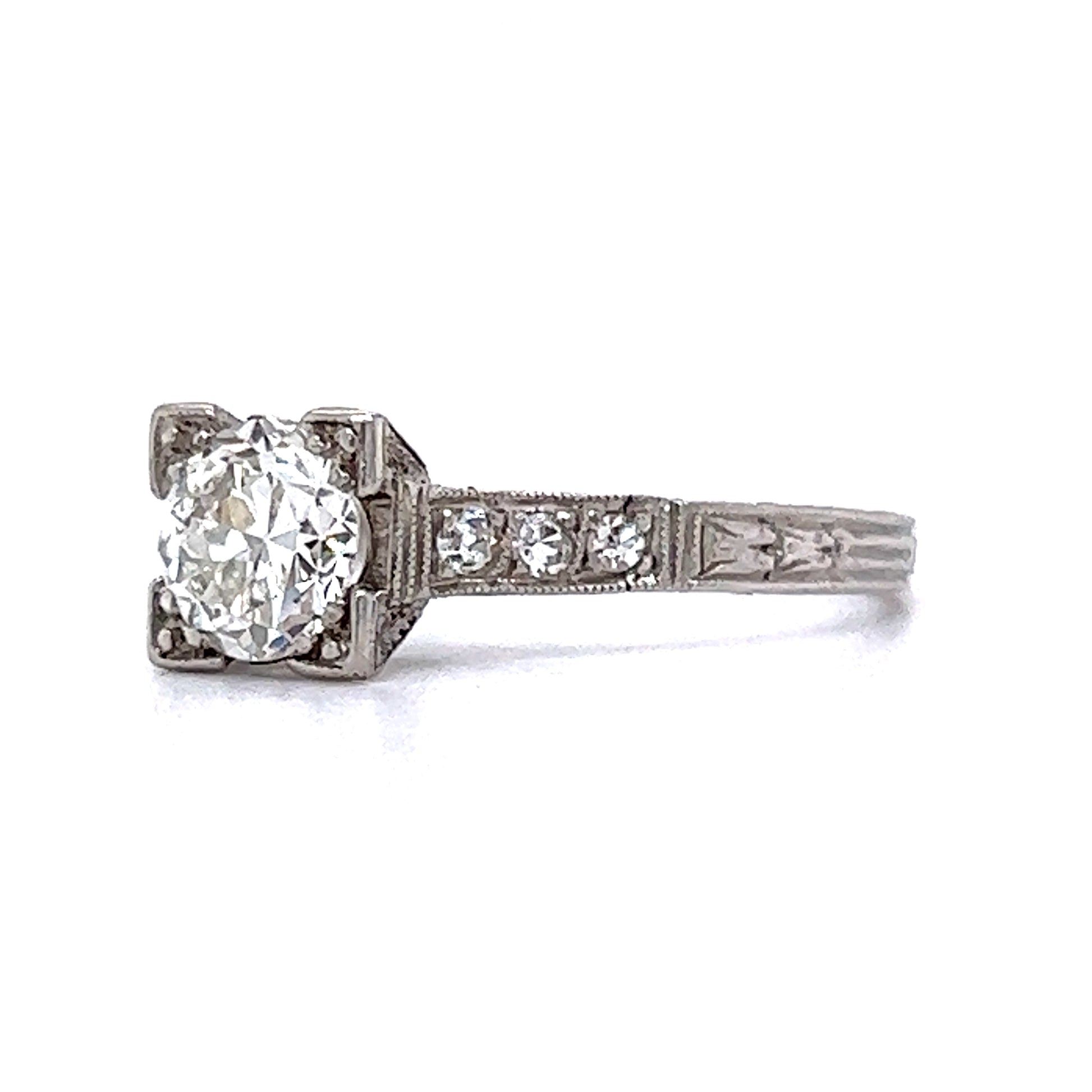 .70 Old European Cut Diamond Engagement Ring in PlatinumComposition: PlatinumRing Size: 7Total Diamond Weight: .79 ctTotal Gram Weight: 2.6 gInscription: 5% IRID PLAT