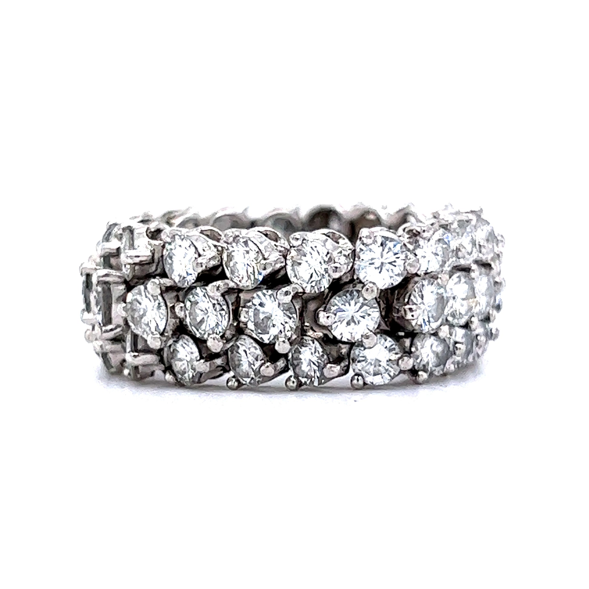 Flexible Diamond Eternity Band in PlatinumComposition: PlatinumRing Size: 7.5Total Diamond Weight: 5.60 ctTotal Gram Weight: 11.20 gInscription: 566