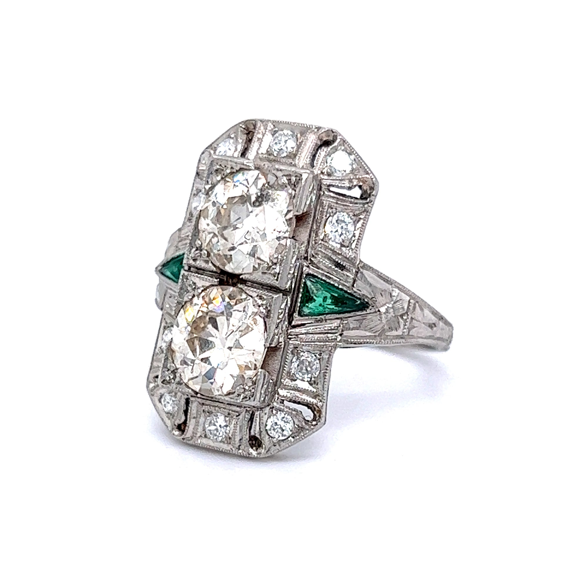 Antique Double Diamond & Emerald Cocktail Ring in PlatinumComposition: PlatinumRing Size: 7Total Diamond Weight: 3.0 ctTotal Gram Weight: 9.0 gInscription: PLATINUM
