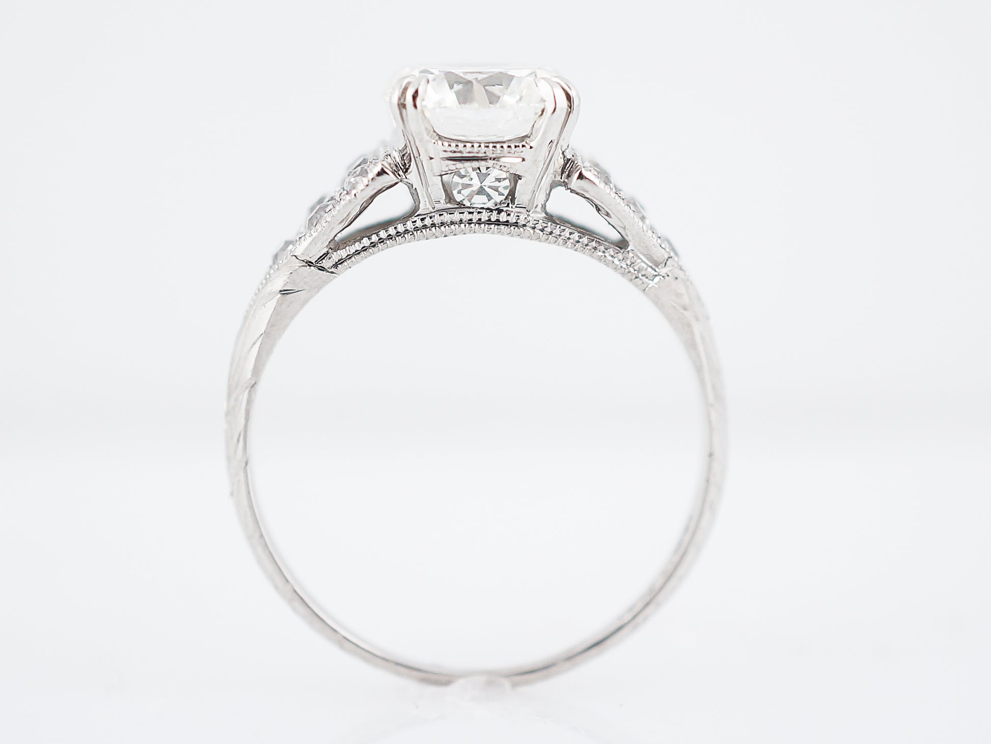 Antique Engagement Ring Art Deco 1.50 GIA Certified Round Brilliant Cut Diamond in PlatinumComposition: PlatinumRing Size: 6.5Total Diamond Weight: 1.74 cttw ctTotal Gram Weight: 3.87 rams gInscription: 10 % IRID PLAT