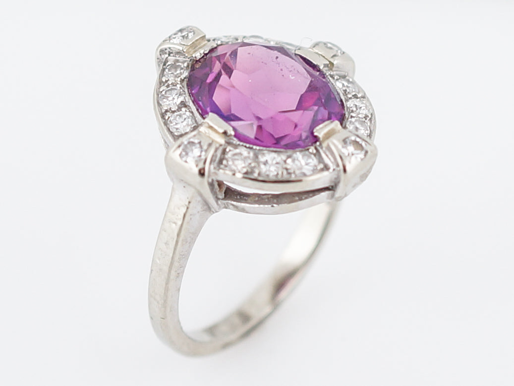 Modern Right Hand Ring 3.00 Oval Cut Pink Amethyst & .25 Round Brilliant Cut Diamonds in 14k White Gold