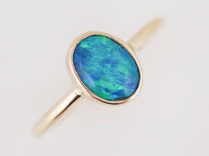 Right Hand Ring Modern .52 Cabochon Cut Opal in 14k Yellow Gold