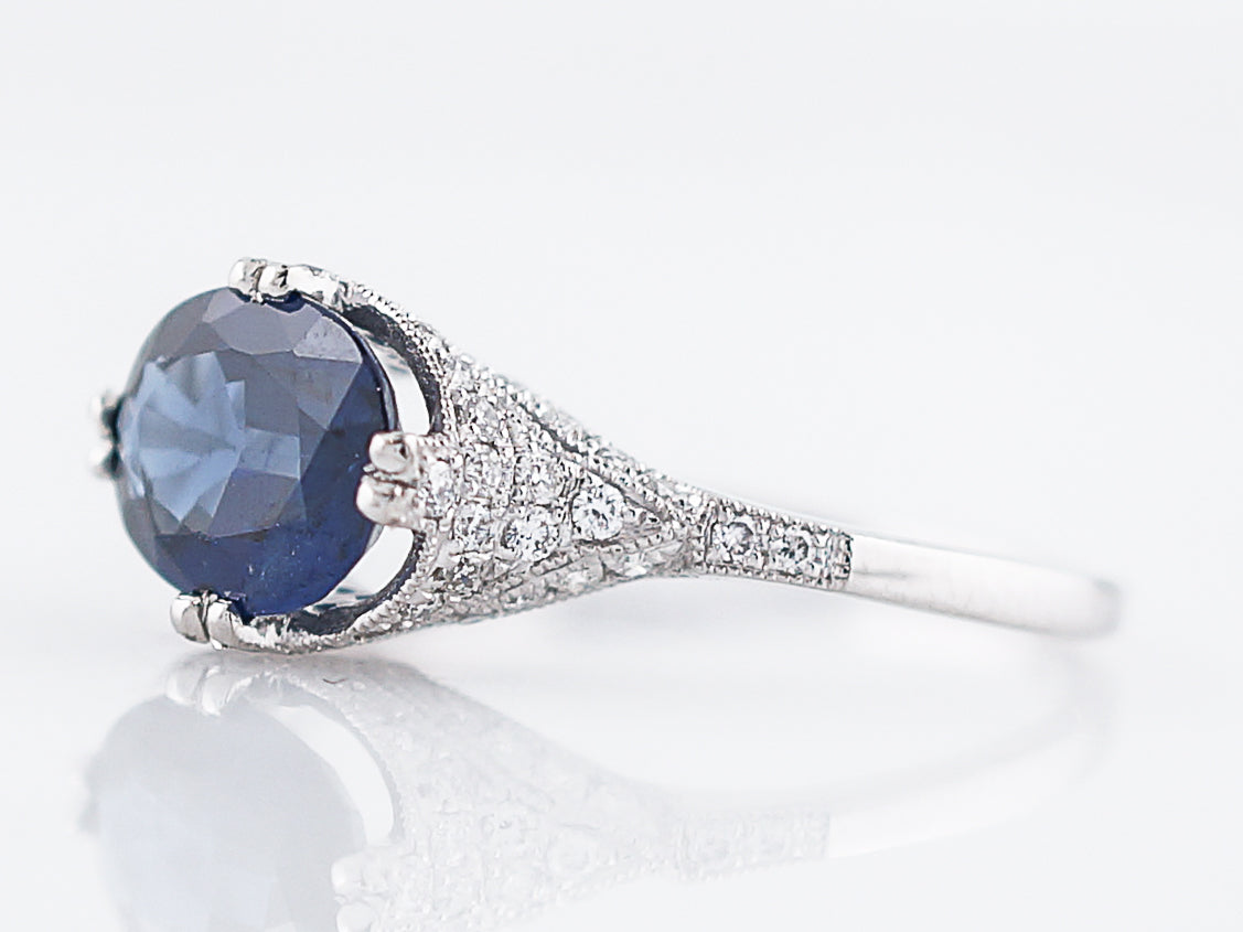 Engagement Ring Modern 1.42 Oval Cut Sapphire & .52 Round Brilliant Cut Diamonds in Platinum