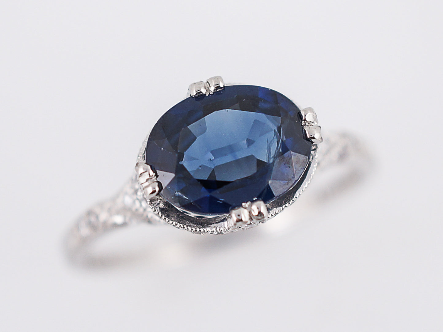 Engagement Ring Modern 1.42 Oval Cut Sapphire & .52 Round Brilliant Cut Diamonds in Platinum