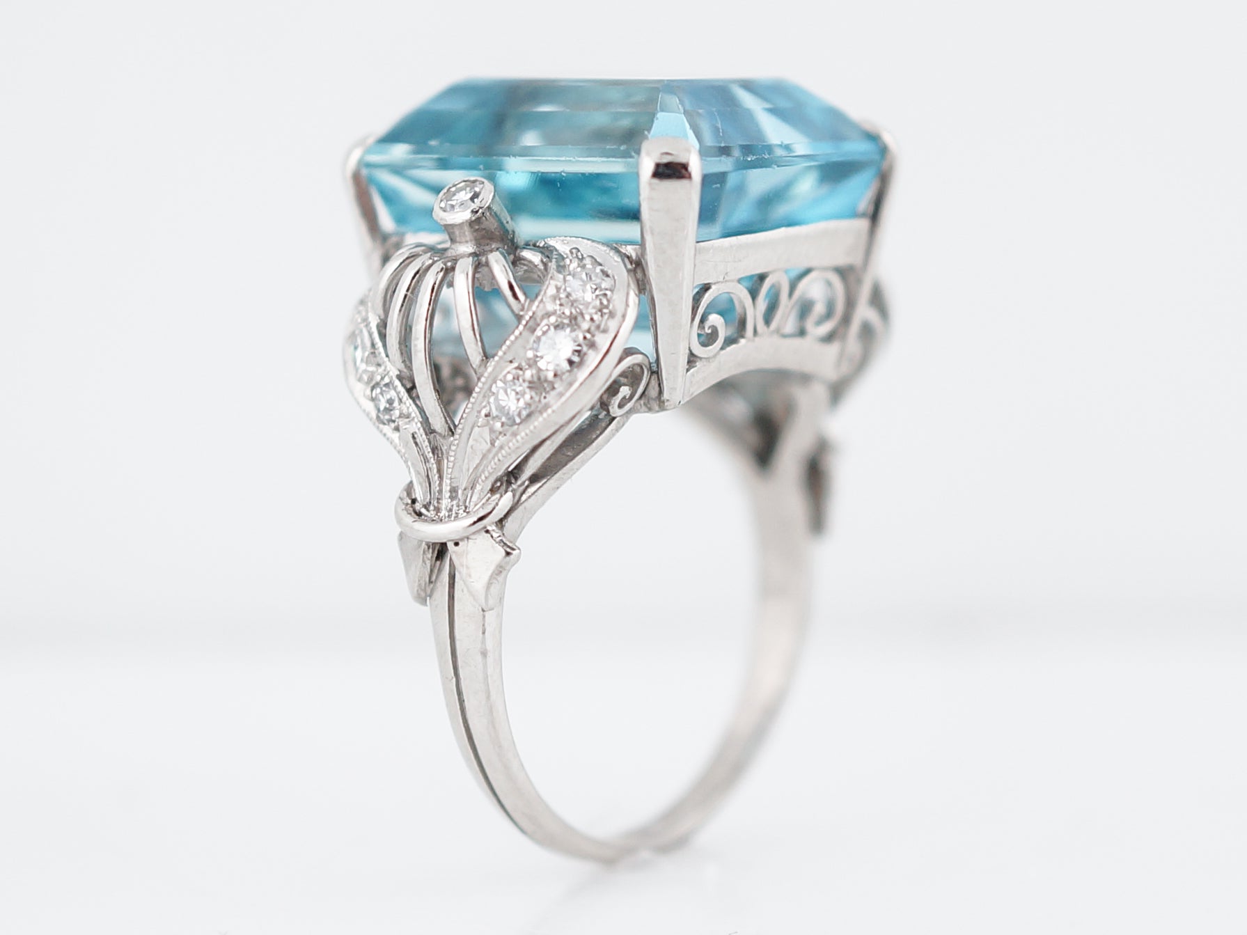 Antique Right Hand Ring Art Deco 12.40 Emerald Cut Aquamarine & .12 Single Cut Diamonds in PlatinumComposition: PlatinumRing Size: 6Total Diamond Weight: .12 cttw ctTotal Gram Weight: 8.60 rams g