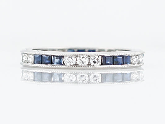 Eternity Wedding Band Modern .45 Round Brilliant Cut Diamonds and Sapphire in Platinum