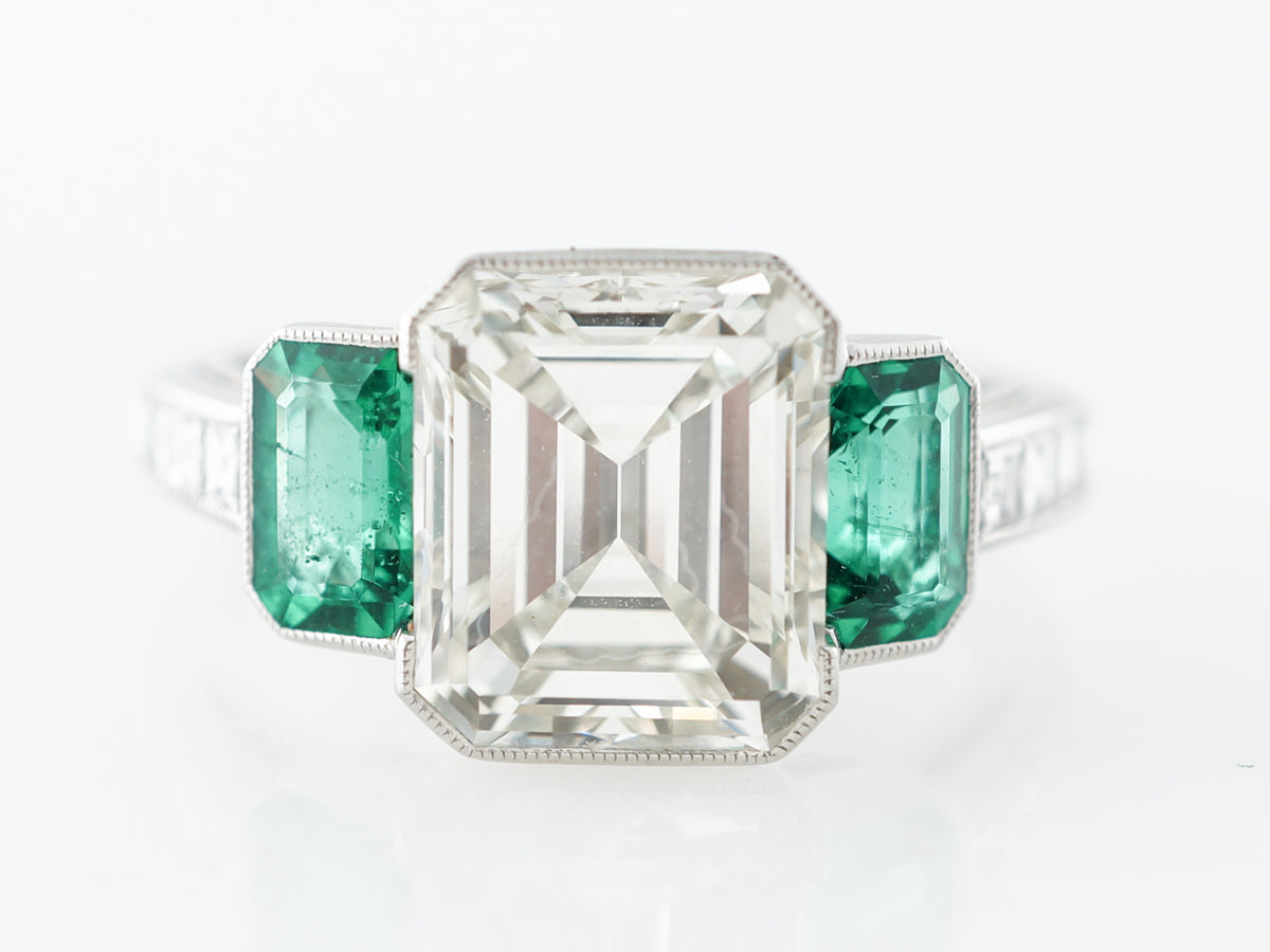 Three Stone Emerald Cut Diamond Engagement Ring in Platinum