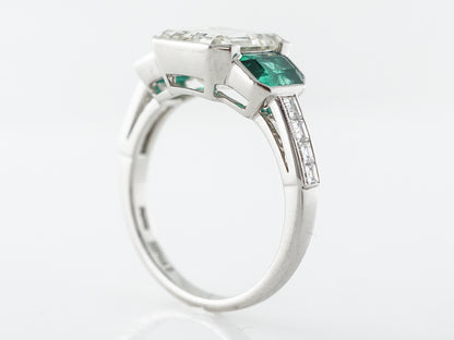 Three Stone Emerald Cut Diamond Engagement Ring in Platinum