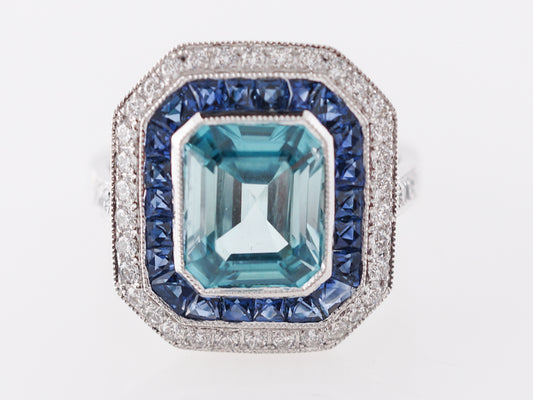 Blue Zircon Ring with Sapphire & Diamond Halo