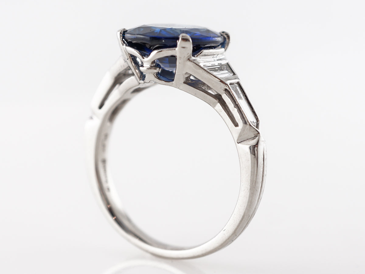 Solitaire Cushion Cut Sapphire Engagement Ring in Platinum