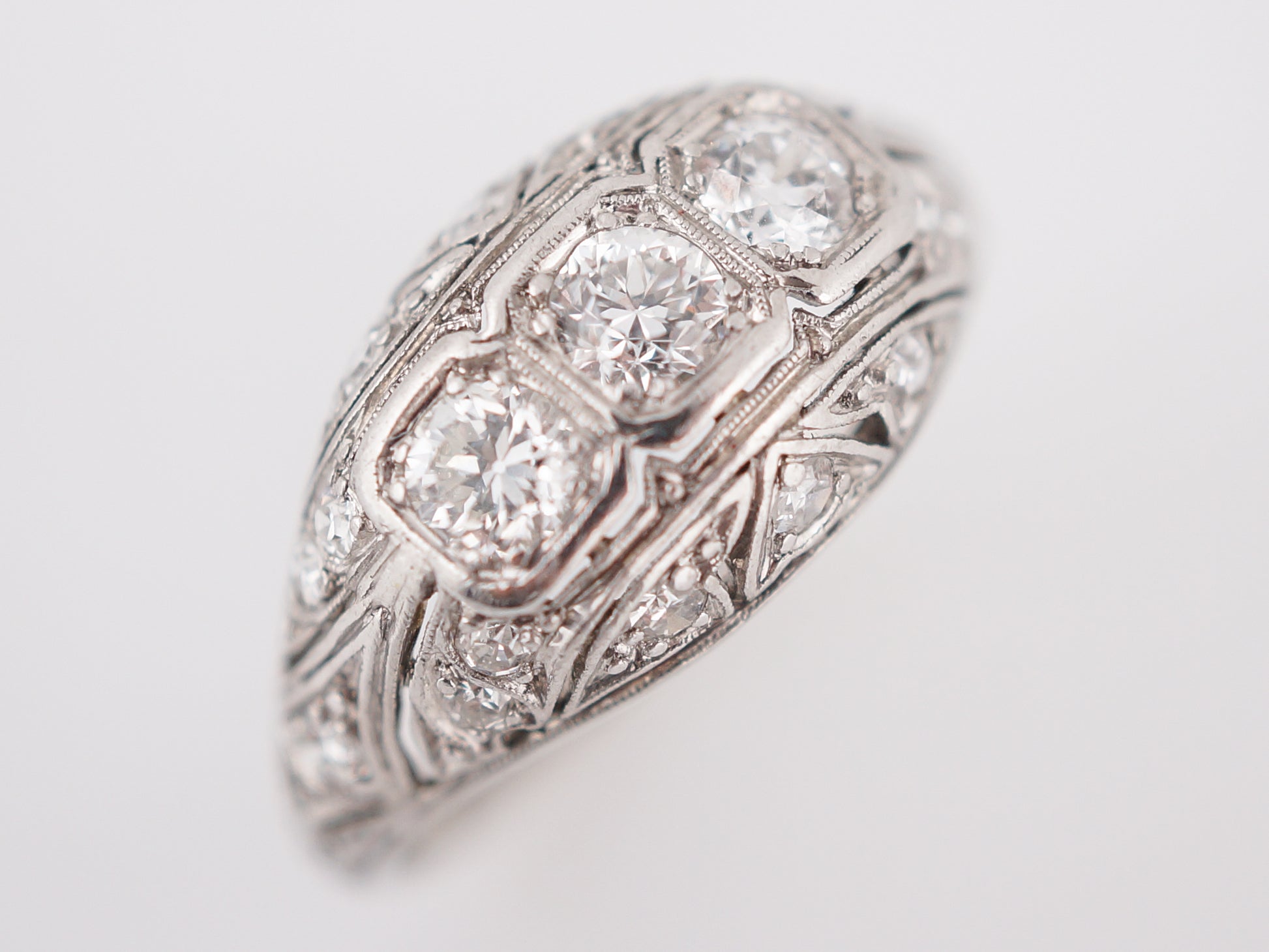 Filigree Three Stone Diamond Engagement Ring in Platinum