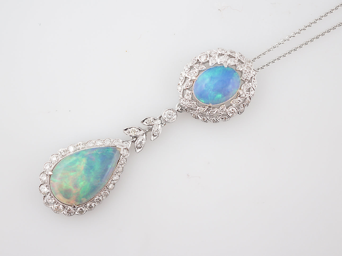 Necklace Modern 3.16 Oval & Pear Cut Opals & .63 Round Brilliant Cut Diamonds in 18K White Gold