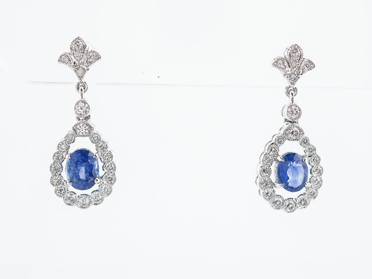 Earrings Modern 1.61 Oval Cut Sapphires & .61 Round Brilliant Cut Diamonds in 18k White Gold