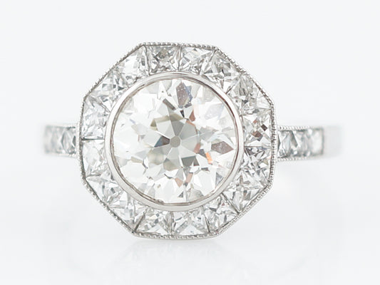 Vintage Style Diamond Halo Engagement Ring in Platinum