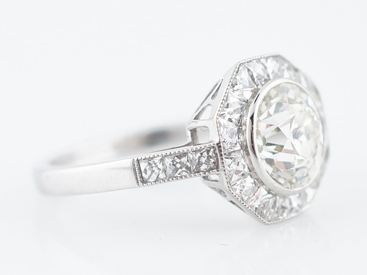 Vintage Style Diamond Halo Engagement Ring in Platinum