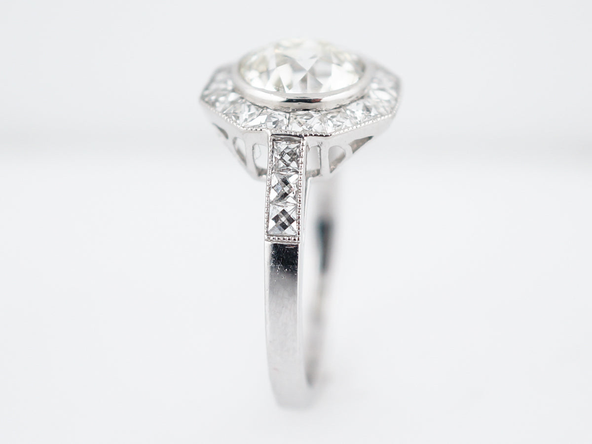 Vintage Style Diamond Halo Engagement Ring in Platinum
