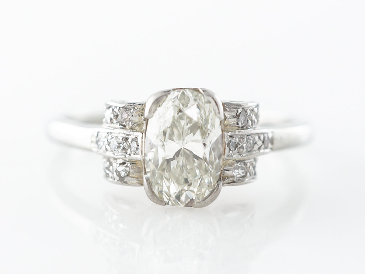 Antique Art Deco Oval Engagement Ring in Platinum & 18k