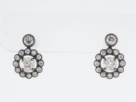 Vintage Style Diamond Halo Earrings in Platinum