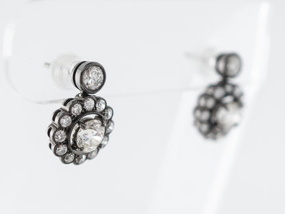 Vintage Style Diamond Halo Earrings in Platinum