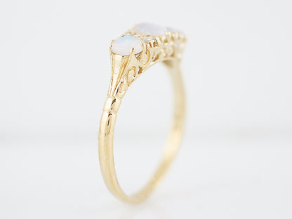 Antique Right Hand Ring Victorian .35 Oval Cabochon Cut Opal & .04 Round Brilliant Cut Diamonds in 18k Yellow Gold