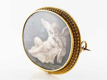 Antique Victorian Painted Cherub Brooch in 18k Yellow Gold