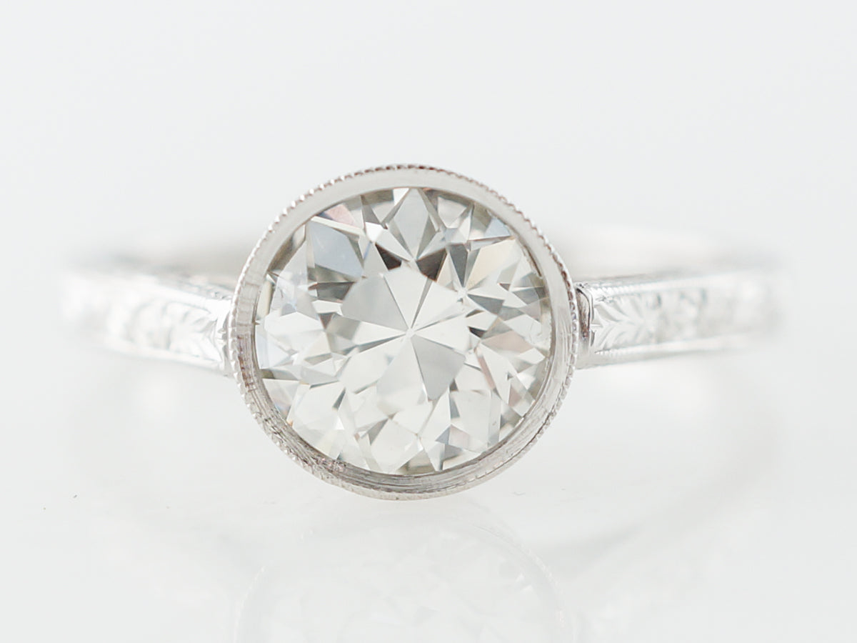 Art Deco Bezel Solitaire Engagement Ring in Platinum