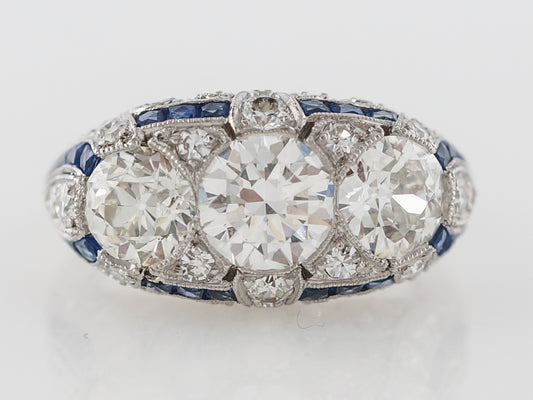 Antique Three Stone Diamond & Sapphire Ring in Platinum
