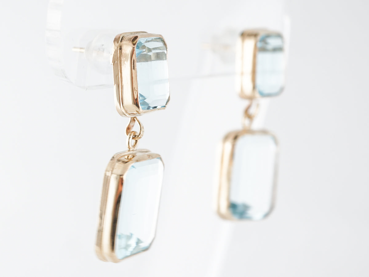 Emerald Cut Aquamarine Earrings in 14k Yellow Gold