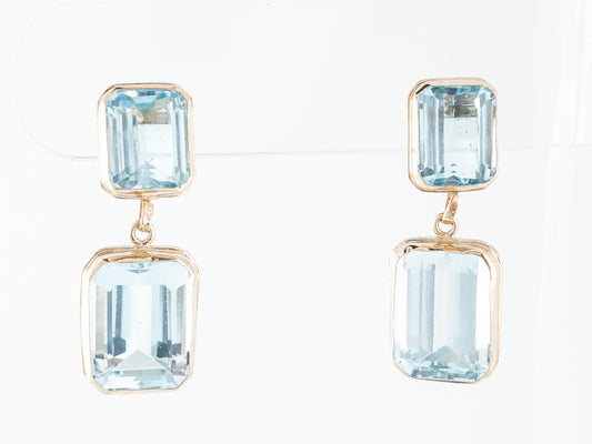 Emerald Cut Aquamarine Earrings in 14k Yellow Gold