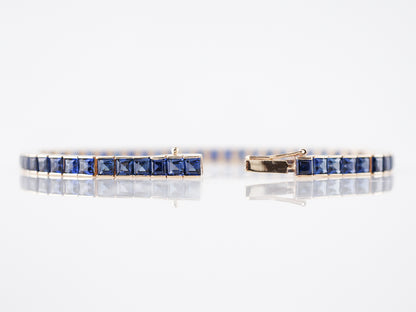 Bracelet Modern 12.10 Step Cut Sapphires in 14K Yellow Gold