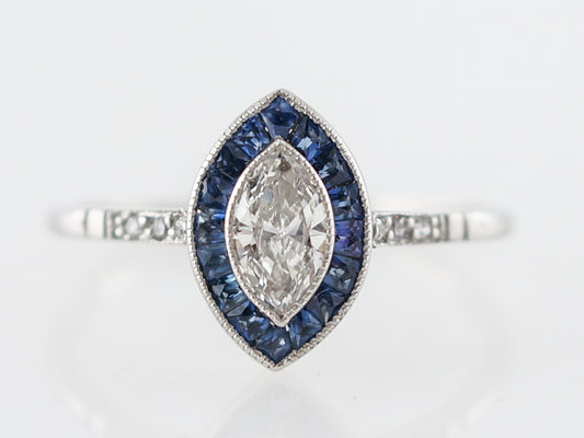 Marquis Diamond Engagement Ring w/Sapphire Halo in Platinum