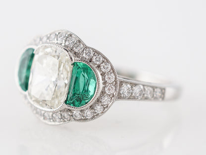 Diamond & Emerald Three Stone Engagement Ring