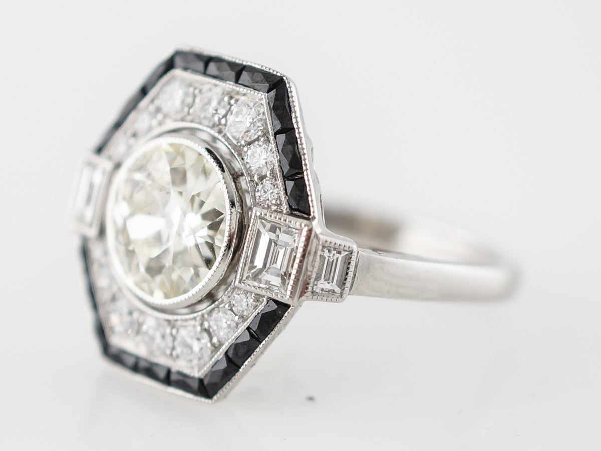 Diamond & Onyx Halo Engagement Ring in Platinum