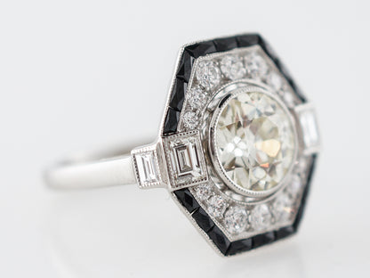 Diamond & Onyx Halo Engagement Ring in Platinum