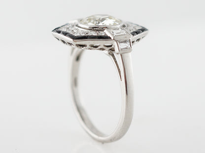 Diamond & Onyx Halo Engagement Ring in Platinum