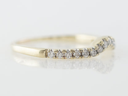.25 Diamond Curved Wedding Band in Yellow Gold
