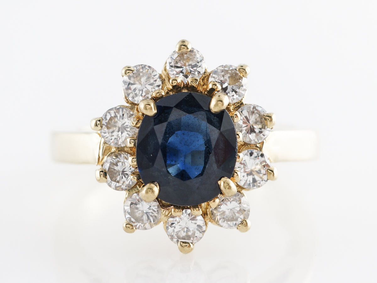 Cushion Cut Sapphire w/ Diamond Halo Engagement Ring in 18k
