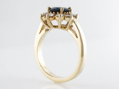 Cushion Cut Sapphire w/ Diamond Halo Engagement Ring in 18k