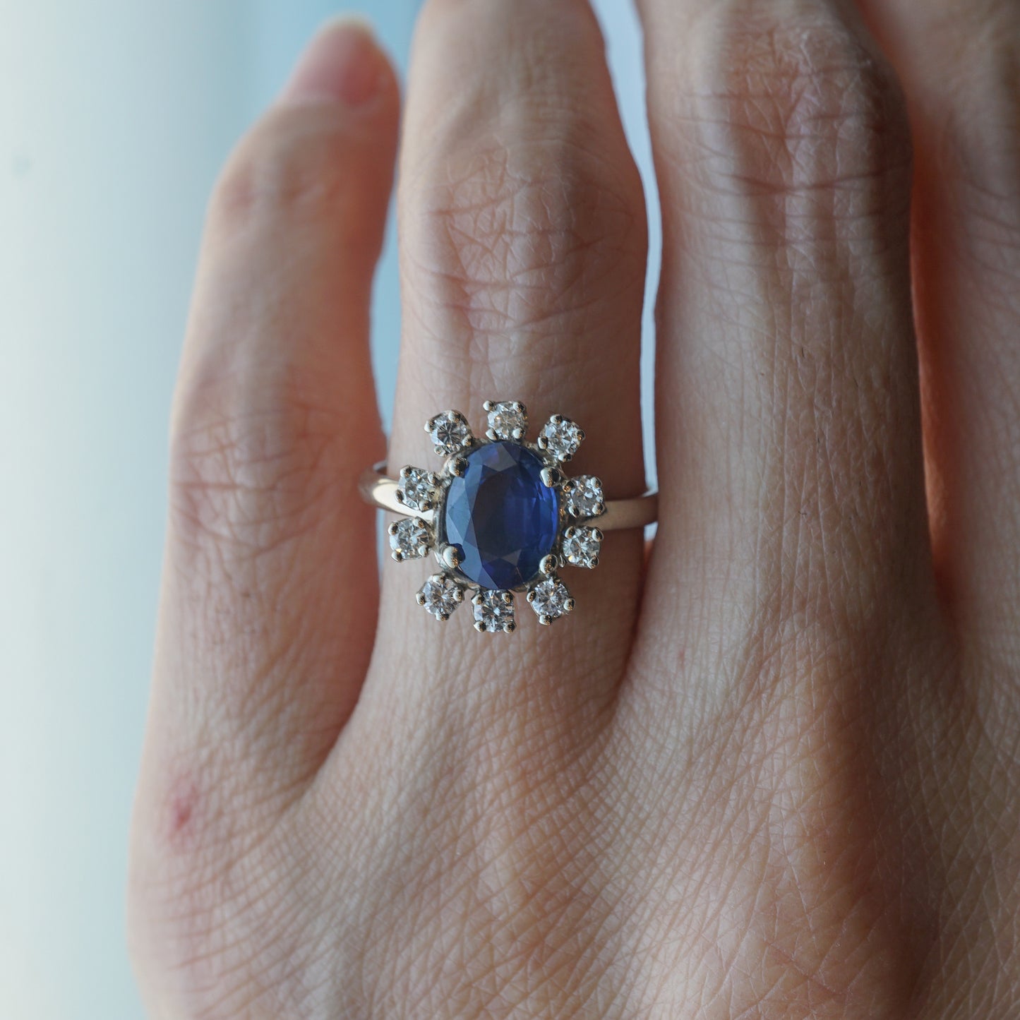 Oval Blue Sapphire & Diamond Halo Ring in 14k White Gold